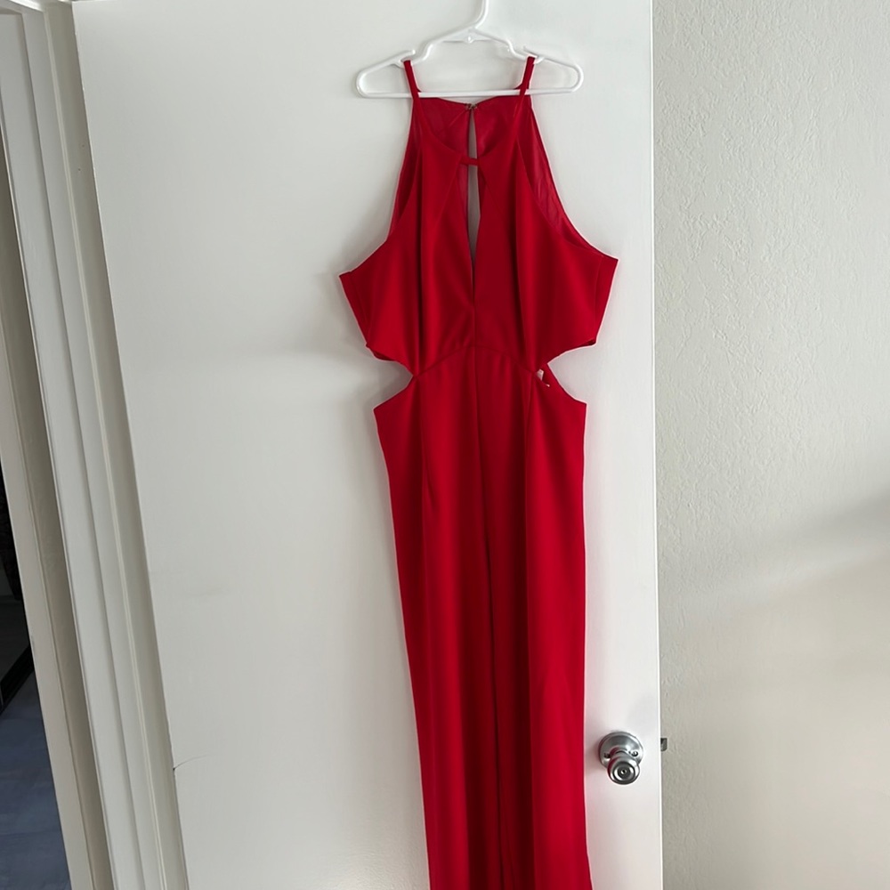 Red pants suit